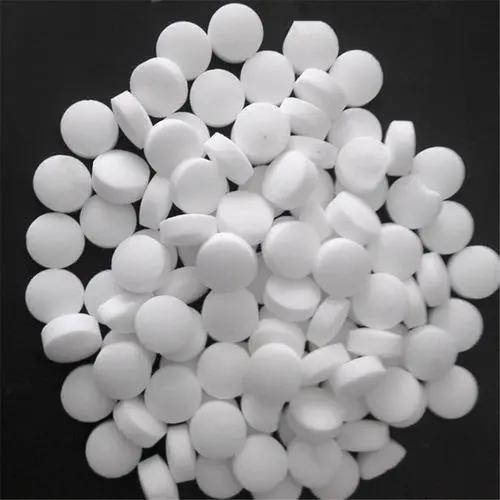 Water softener tablets stacked for packing